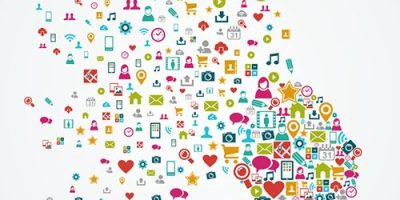 Woman head silhouette made with social media icons splash concept illustration. EPS10 vector file organized in layers for easy editing.