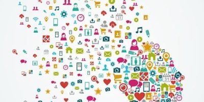 Woman head silhouette made with social media icons splash concept illustration. EPS10 vector file organized in layers for easy editing.