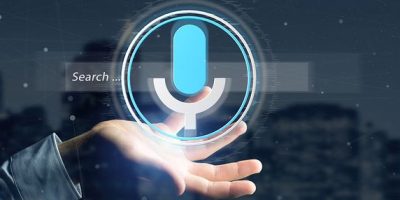 View of a Businessman holding a Vocal search system with button and icon3d rendering